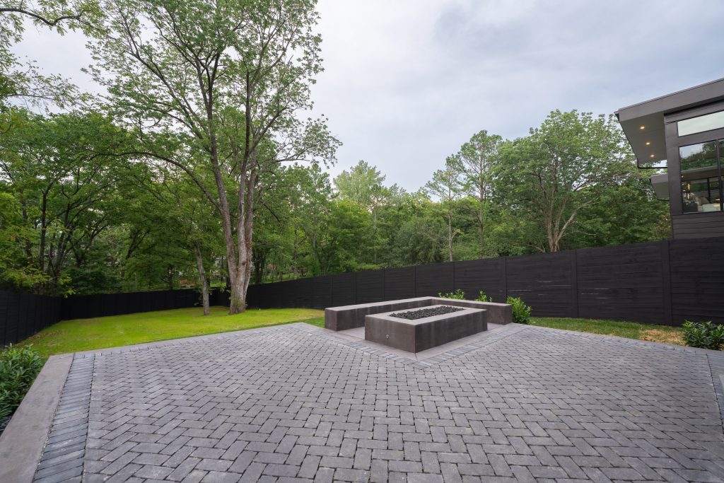 3812 A Harding - by Rainer Schuertzmann-69 (1) backyard stone patio with a built in fireplace