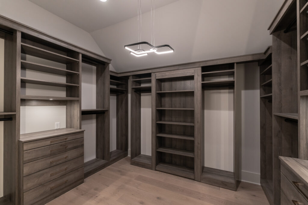 3122 B Belwood - by Rainer Schuertzmann-56 walkin closet with brown builtin shelving