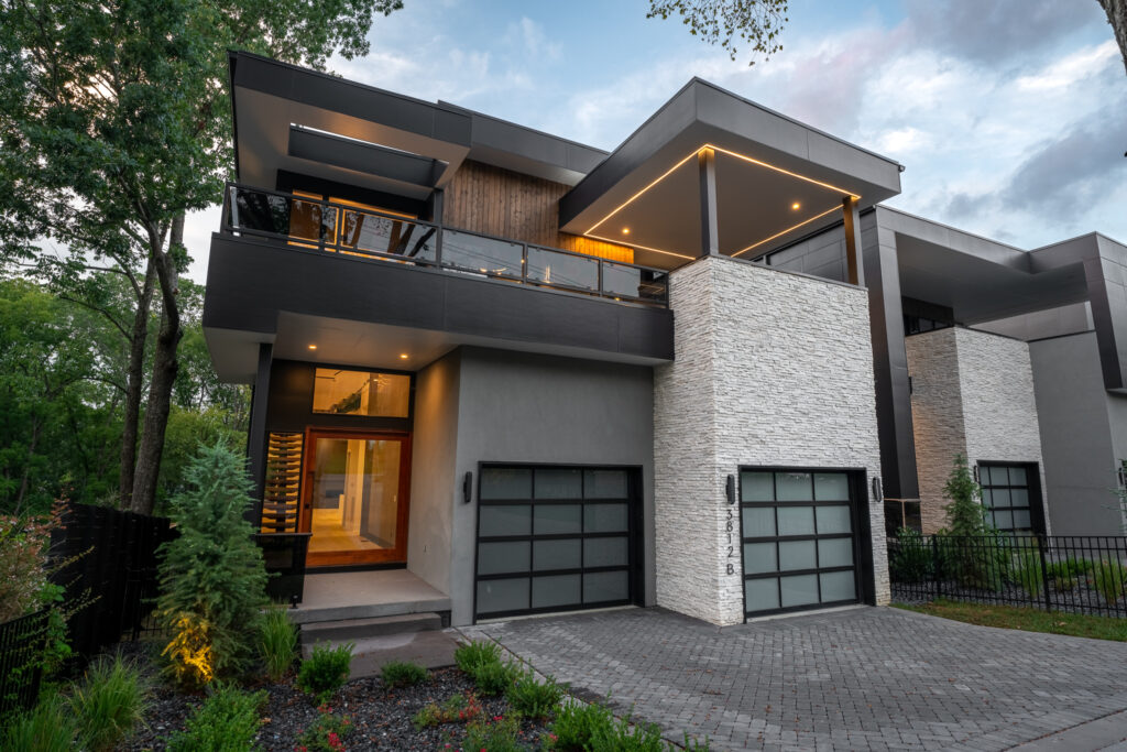 3812B Harding - by Rainer Schuertzmann-003 luxury nashville home with a two car garage and awning with underlight